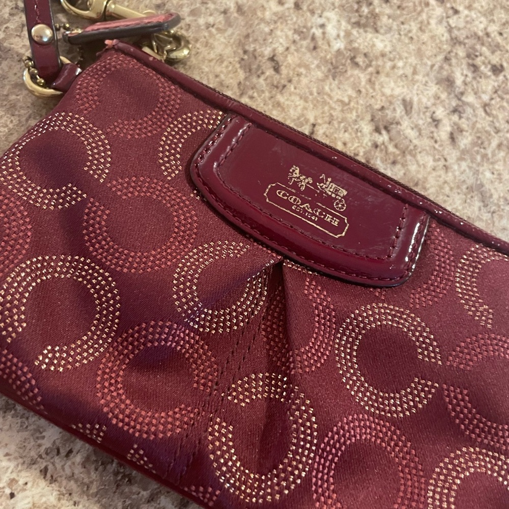 Coach Maroon and Gold Patterned Wristlet